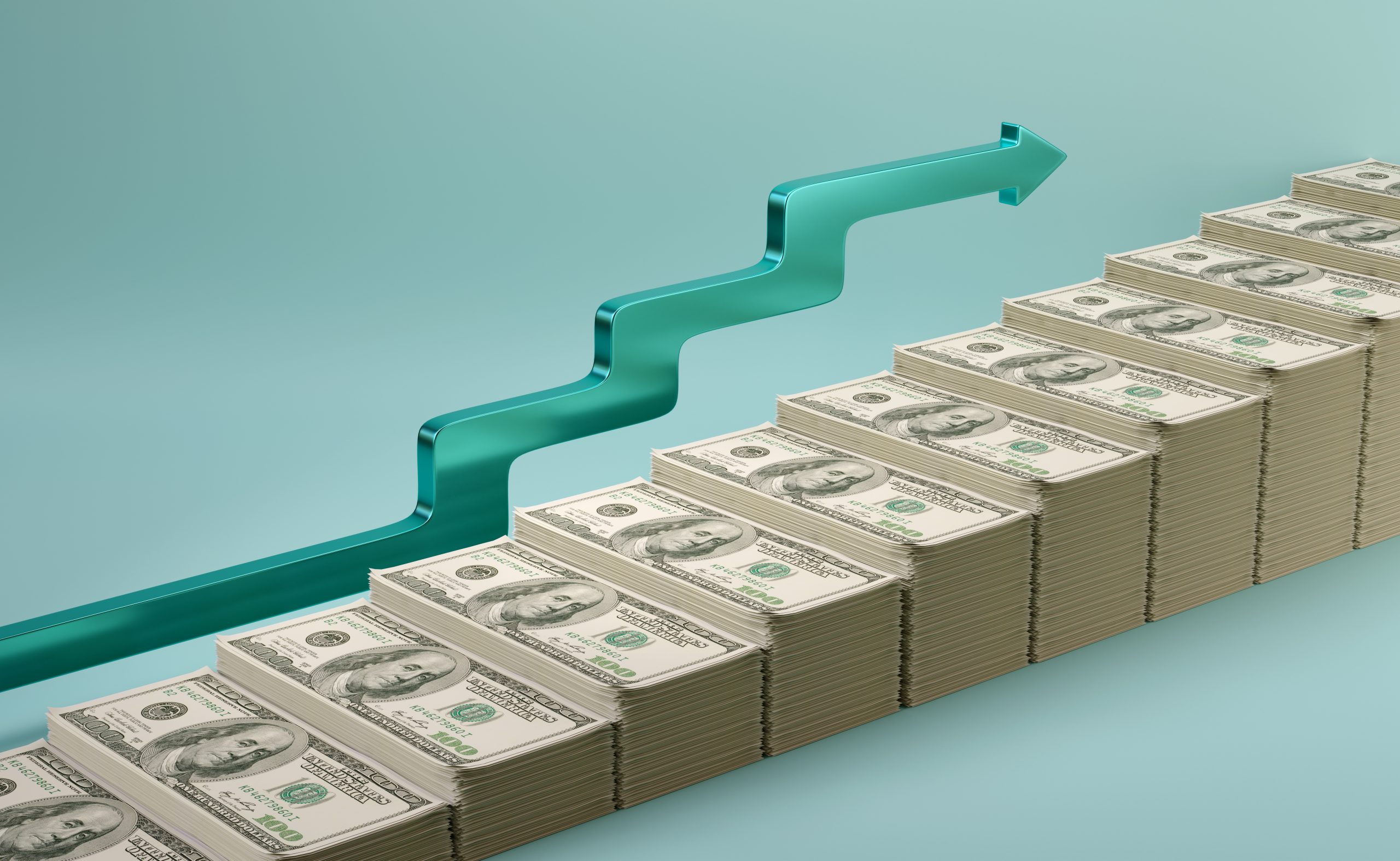 Progressively larger stacks of dollars with a green upward trending arrow.